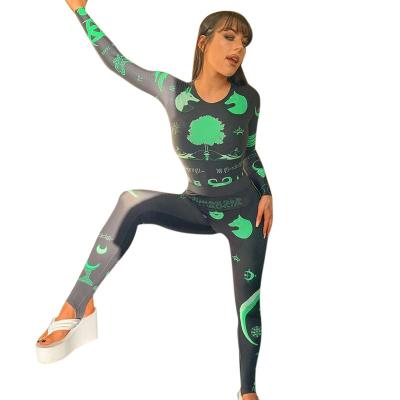 China 2022 Winter SKOCLS Spandex/Polyester New Moon Print Long Sleeve Ey21SA61 Set Tight Pedal Pants Pant Suit For Women for sale