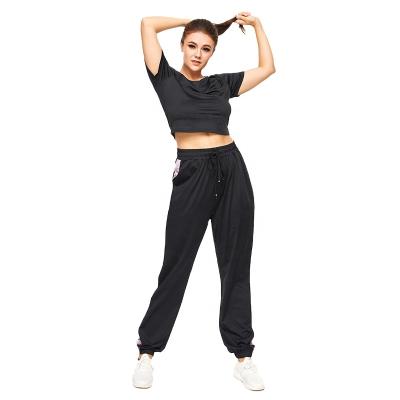 China Breathable hot stock sportswear plus size crop top women plus size women clothing tracker sets for sale