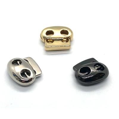 China High Quality Custom Made Metal Rope Stopper Metal Oval 2 Holes Cord Lock Nickel Free Stopper For Garment for sale