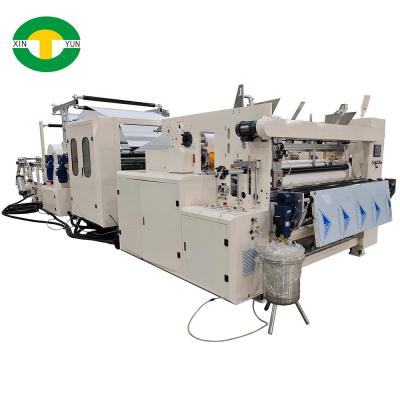 China Xinyun Machinery 2 colors printing toilet tissue paper / maxi paper towel roll making machines for sale