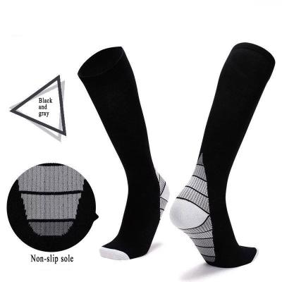 China Wholesale Compressed Cotton Men's Non-Slip Nylon Sports Breathable Custom Logo Knee High Top Football Socks Long for sale