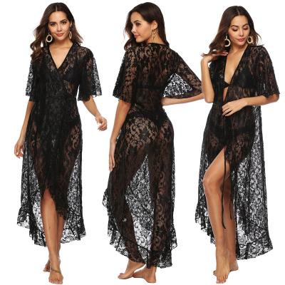 China Best Selling Anti-UV Hand Hook Stitching Fringed V-Neck Long Sleeve Loose Blouse Beach Dress Short Dress for sale