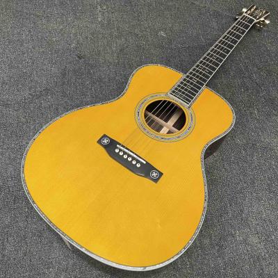 中国 Custom OM Body Yellow Painting Acoustic Electric Guitar with SOLID ROSEWOOD Back Side 販売のため