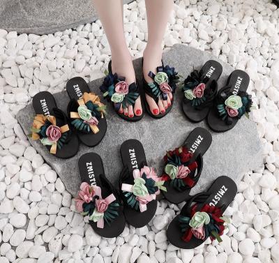 China 2022 fashion breathable slippers for family girl thick bottom non-slip slippers with flower outdoor beach quite relieve casual slippers for sale