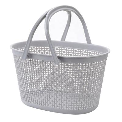 China Plastic Stocked Kitchen Utensils Storage Basket Household Bathroom Clothes Storage Basket With Handle for sale