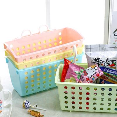 China The viable manufacturer's new fashion and creative universal hook storage basket kitchen and bathroom drain storage basket for sale