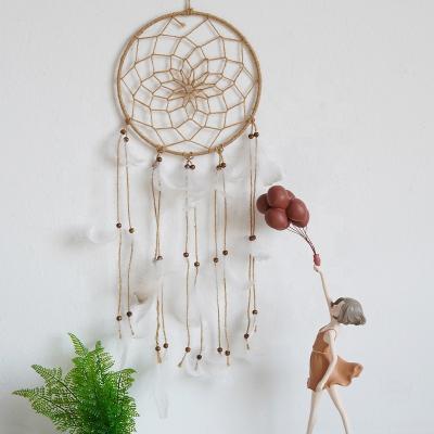 China Factory home handmade cotton macrame hanger children's dector indoor dreamcatcher with feather wall hanging boho rope cords for sale