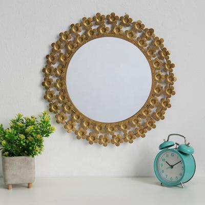 China Contemporary Luxury Round Frame Flower Rose Gold Mirror Iron Metal Power Coated Exterior Wall Dector Make Up Beveled Mirrors for sale