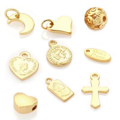 China Trendy 10pcs Fashion Bag Gold Plated Tiny Heart Moon Cross Star Around Broken Ring Charms Necklace Pendants For Jewelry Making for sale