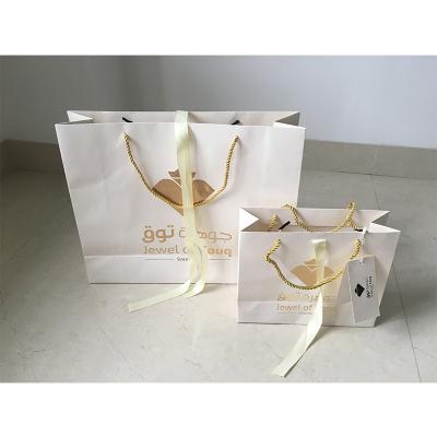 China Texture Shopping Recyclable Paper Bag With Handle for sale