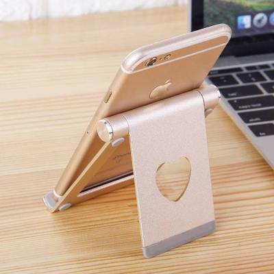 China Double Adjustable Aluminum Heart Shape Multi-Angle Fold Mobile Phone Stand Tablet Holder For iPad for sale