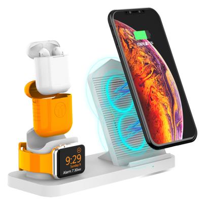 China Adjustable Plastic Smart Earphone Watch Stand Desk Stand Phone Holder ABS Wireless Charging Stand for sale