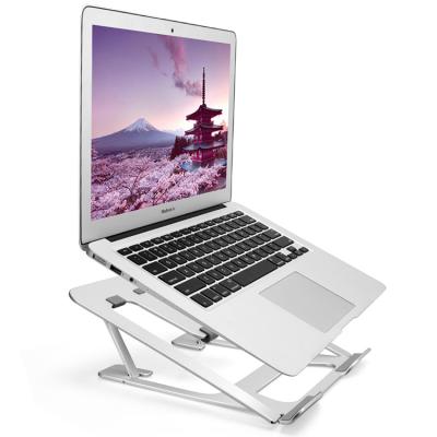 China Portable Folding Ergonomic Adjustable Laptop Desk Table Stand (Height) Adjustable Aluminum Laptop Stand for sale