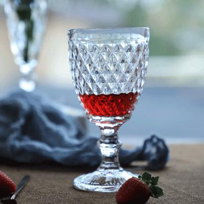 China New creative European style classical/postmodern exquisite color red wine embossed hotel glass party goblet banquet goblet for sale