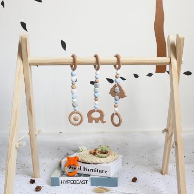 China Educational Eco-Friendly Hot Eco-friendly Baby Indoor Natural Wood Gymnasium Game Activity Sale Aliexpress Hanging Toy for sale