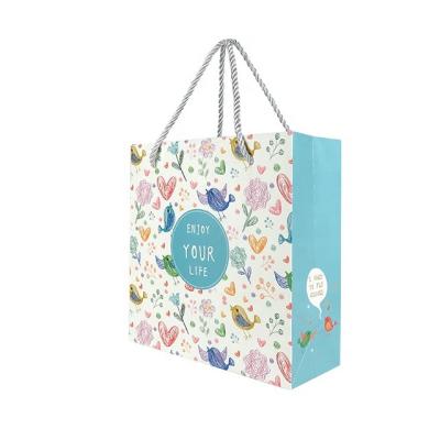 China Custom design biodegradable cute luxury girls small shopping bag OEM/ODM logo printed paper gift bags for sale