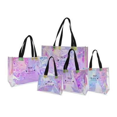 China OEM/ODM Laser PVC Shopping Bag Reusable Clear Transparent Holographic Transparent Wholesale Reusable Goods for sale