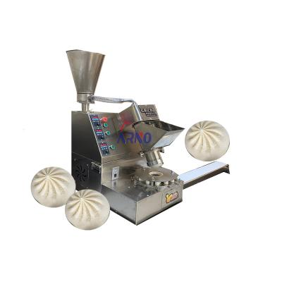 China High speed low energy small momo dimsun with meat stuffing machine Tablet type small steamed bun making machine for sale