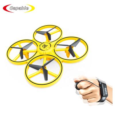 China Hot Smart RC Quadcopter Tik Tok Gravity Sensor Control Wrist Watch Drone Quadcopter With Light for sale