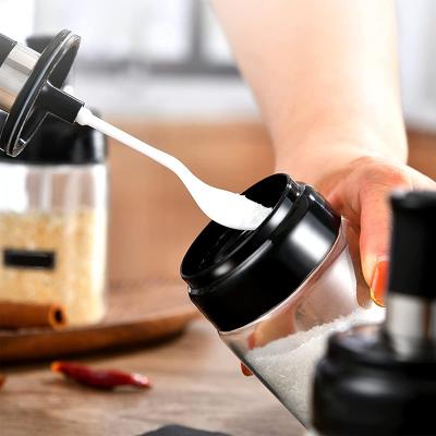 China Viable Kitchenware Clear Seasoning Salt Pepper Bottles Glass Shaker Bottle Jam Spice Jar Container With Spoon for sale