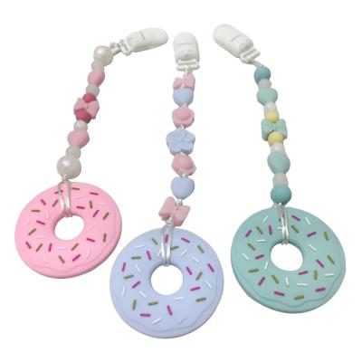 China 100%food grade Silicone Teether Donut Shape Silicone Beads Baby Pacifier Clip/Baby Teether Pacifier Holder Clip for sale