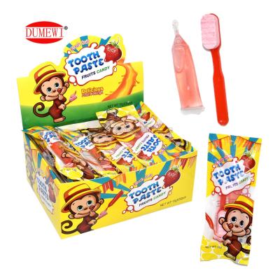 China Natural Funny Taste Tablet Candy Toothbrush With Fruit Flavor Liquid Drink Toothpaste Kids Play Candy for sale