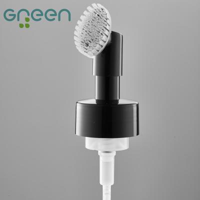 China Non Spill Facial Cleansing Brush Foam Pump With Silicone Brush Foam Pump Dispenser for sale