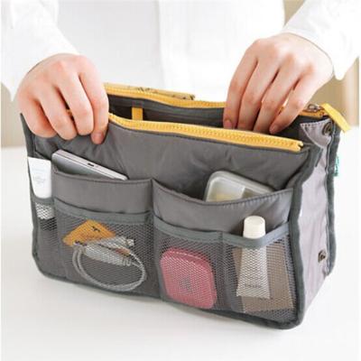 China 2021 Wholesale New Product Cheap Nylon Hand Held Viable Mini Storage Bag for sale