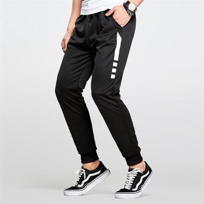 China Spring and Autumn Korean men's casual pants youth slim fit fashion anti-pilling pants fashionable men's trousers a hair substitute for sale