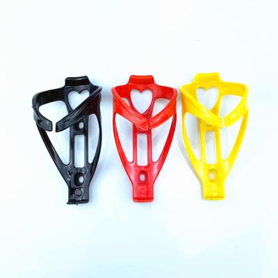 China Wholesale Mountain Bike Road Bicycle Bottle Cage Manufacturer Outdoor Type Plastic Bottle Cage Water Cup Bicycle Sports Bottle Cage Fin Holder for sale