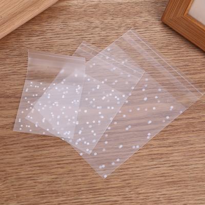 China High Quality 100/Pack Dot Ziplock Snack Bag Snowflake Opp Candy Bag Self Adhesive Seal Polka Dot Biscuit Bag Self-Adhesive for sale