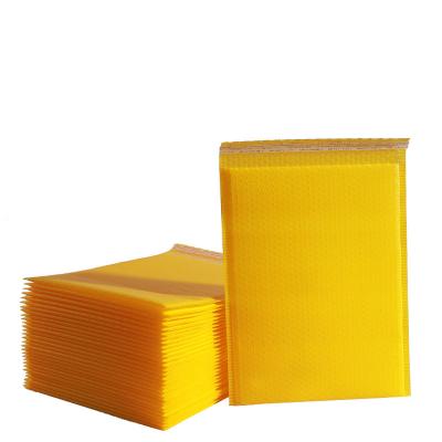 China Hot Selling Yellow Shock Resistance Envelopes Bubble Mailing Mailing Bags Kraft Paper Padded Envelope For Courier Packaging for sale