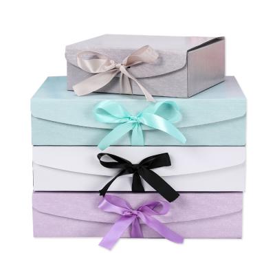 China Recycled Materials Wholesale Closure Gift Box With Ribbon Luxury Paperboards Folding Packaging Gift Box for sale