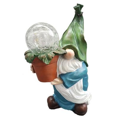 China Europe Resin Gnome Figurine Carrying Magic Globe with Solar LED Lights Outdoor Decorations Garden Gnome Statue for Patio Yard Lawn Porch for sale