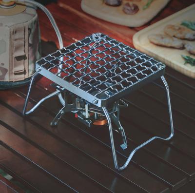 China Non-Stick Folding Portable Outdoor Camping Wood Stove Rack Campfire Grill Stainless Steel Grill Grate Gas Stove Stand for sale