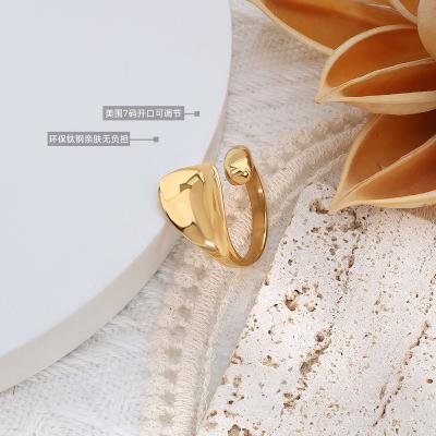 China Wholesale Vintage Gold Stainless Steel Never Rusted And Exaggerated Small Curved Shape Cuff Women for sale