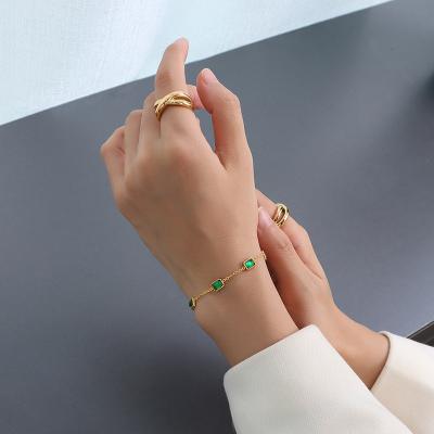 China Women punk luxury gift tasty green stone 18k gold pvd plating tarnish free stainless steel chain bracelet for sale