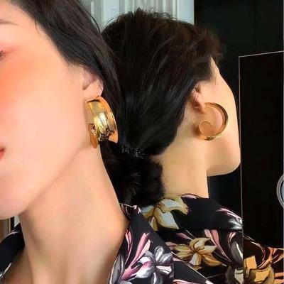 China Women's Personality Statistical Institute Metal Round Irregular Earrings Fashionable Female Casual/Sporty Bow Retro Wild French Circle Earrings for sale