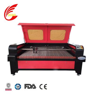 China Hot Selling Auto Feeding System Rolling Laser Cutting Machine Auto Feeding Roll For Sublimation Fabric for sale