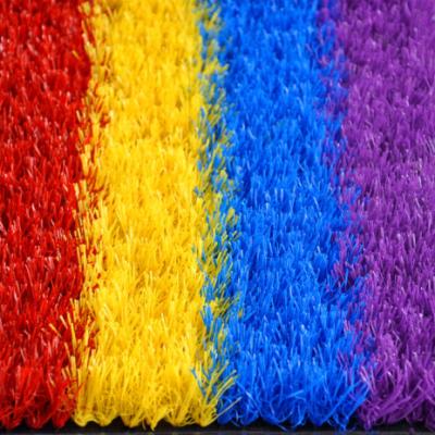 Китай Artificial Grass for Kindergarten Rainbow Artificial Grass Chinese Red Blue Yellow Color Purple Plant for Kindergarten продается