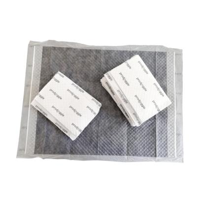 China Viable Disposable Puppy Pee Pad Pet Tissue Paper Charcoal Puppy Protective Pad With OEM Service for sale