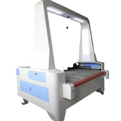 China Water Cooled Provide Customized Services Auto-Feeding Fabric Laser Cutting Machine With CCD for sale