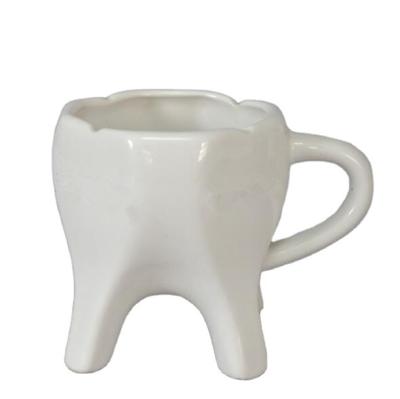 China Sustainable Bathroom Accessories Ceramic Bathroom Ware Popular Tooth Shaped Cup Mug for sale