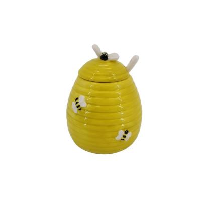 China New 350ML Microwavable High Quality Custom Ceramic Bee Shaped Honey Jar With Lid And Plunger for sale