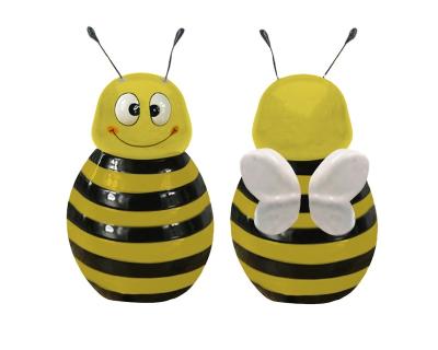 China Sustainable Ceramic Bee Shaped 500ml Fancy And Unique Small Storage Jars For Honey With Wooden Plunger for sale