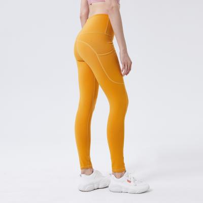 China Breathable Women Fitness Yoga Sportswear Have Phone Pocket Gym Pants High Waisted Workout Tiktok Yoga Pants Gaiters for sale