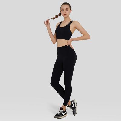 China Breathable Active Back Wear Fitness Suit Workout Sports Bra and Cross Over Sets Women's Yoga Two Piece Gaiters Pants for sale