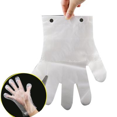 China Cpe Tape Canton Food Disposable Clear Polythene Gloves Waterproof Pe Cleaning Gloves With Hole for sale