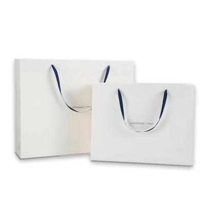 China Glossy Logo Printed White Navy Personalized Recyclable Laminating Gift Carrier Customized Packaging Paper Bags With Rope Handles for sale