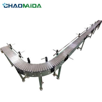 中国 bottle filling line Chain Plate Conveyor line 1 Year Warranty Motor, PLC 200 kg 販売のため